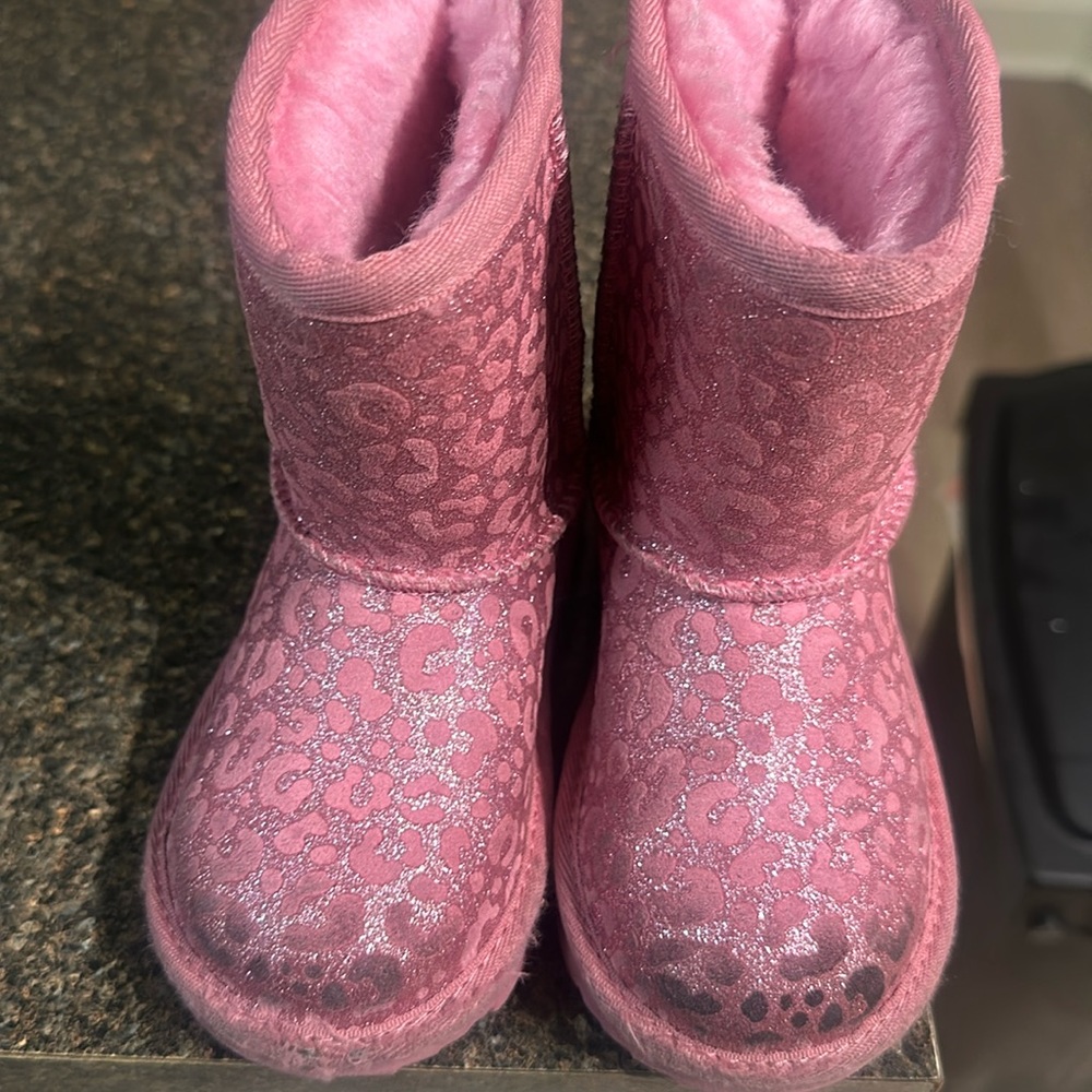 Little girl used pink leopard print Ugg